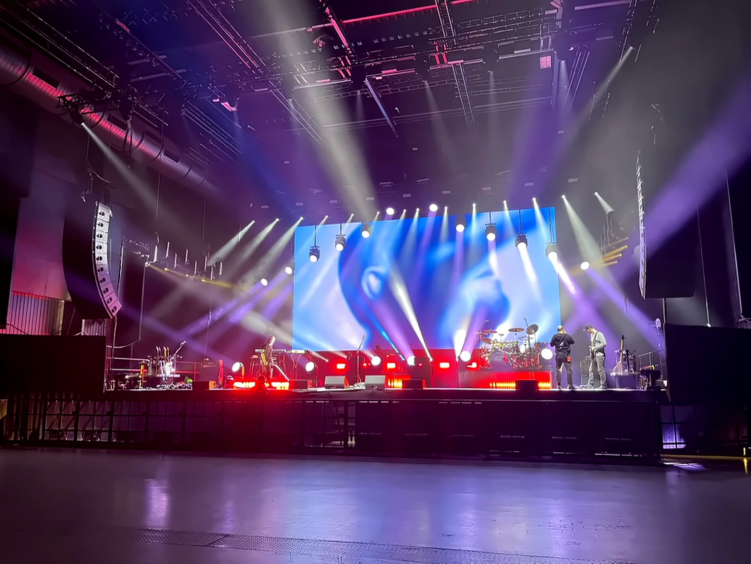 Wide arena view of the Porcupine Tree Closure/Continuation stage, LED screen, PA hangs and lighting, 2022.