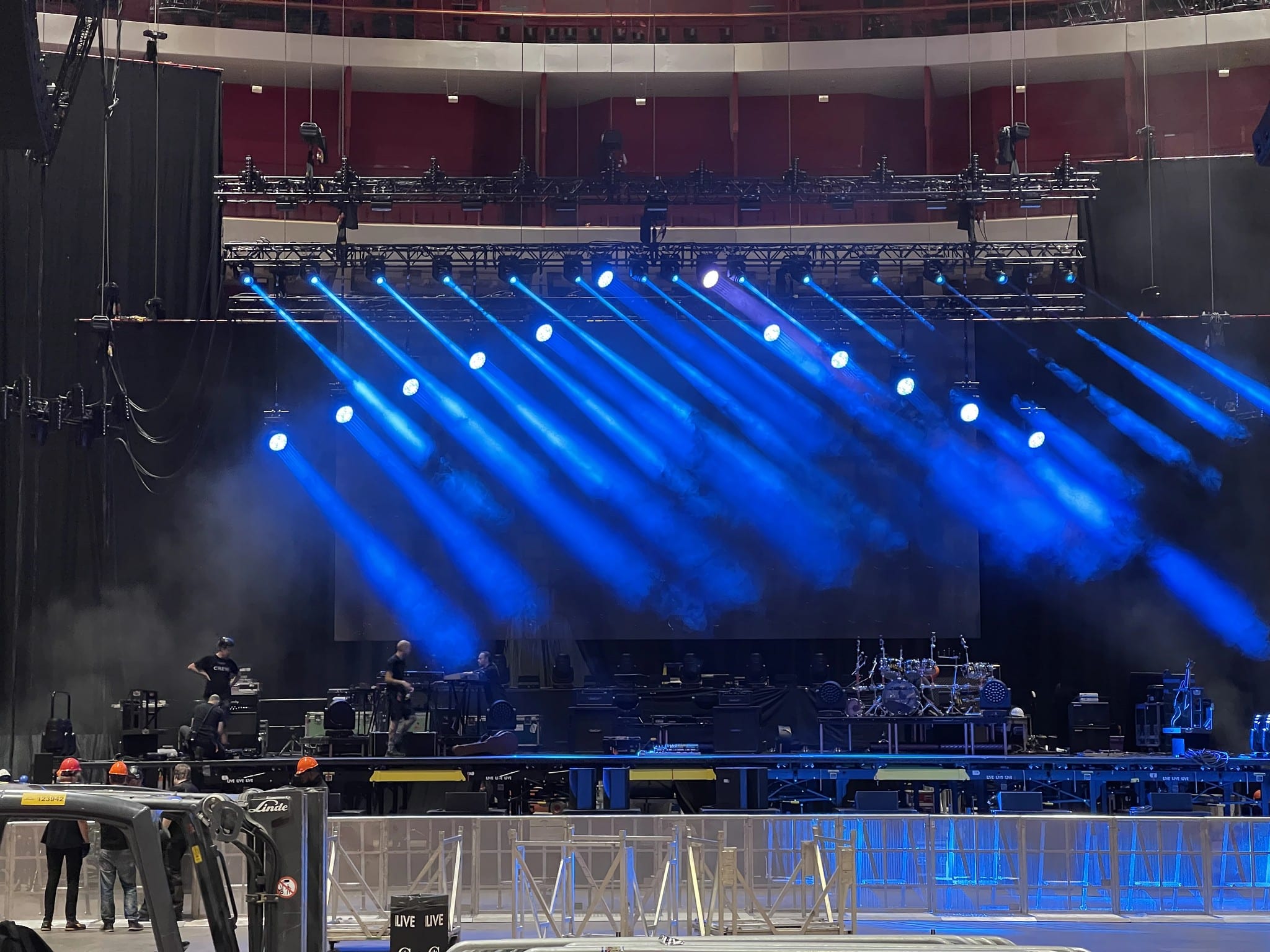 LED line test with blue beams, forklift and crew, Porcupine Tree Closure/Continuation Tour 2022.