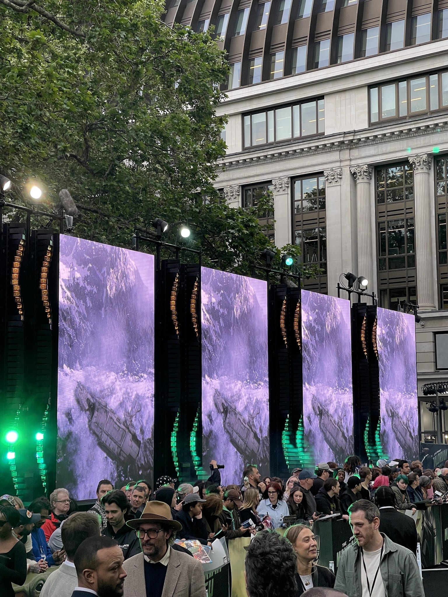Vertical LED wall with cinematic Star Wars content and a Mandalorian banner, Leicester Square, May 2026.